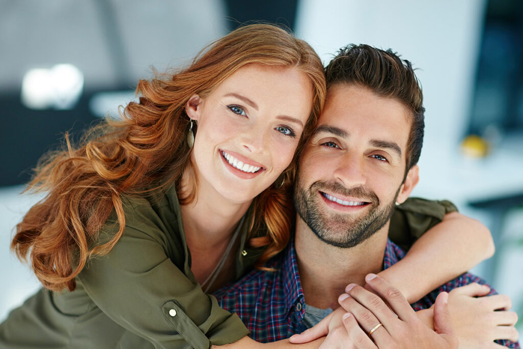 A couple smiling together